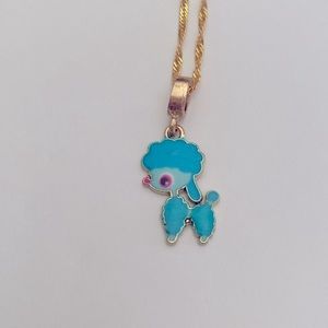 Blue poodle necklace.